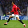 PORTO, PORTUGAL - APRIL 15:  Cristiano Ronaldo of Manchester United celebrates as he scores their first goal during the UEFA Champions League Quarter Final second leg match between FC Porto and Manchester United at the Estadio do Dragao on April 15, 2009 