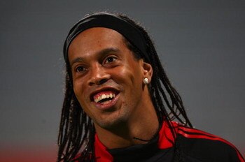 DUBAI, UNITED ARAB EMIRATES - JANUARY 03:  Ronaldinho of AC Milan looks on during a training session during the AC Milan Winter Training Camp at the Al Nasr Sports Club on January 3, 2009 in Dubai, United Arab Emirates.  (Photo by Ryan Pierse/Getty Images