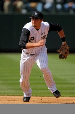 DENVER - APRIL 10:  Second baseman Troy Tulowitzki #2 of the Colorado Rockies plays defense against the Philadelphia Phillies during MLB action on Opening Day at Coors Field on April 10, 2009 in Denver, Colorado. The Rockies defeated the Phillies 10-3.  (