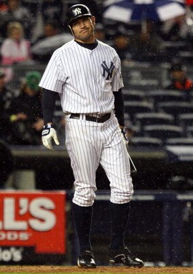 NEW YORK - MAY 05:  Johnny Damon #18 of the New York Yankees bats against the Boston Red Sox on May 5, 2009 at Yankee Stadium in the Bronx borough of New York City. The Red Sox defeated the Yankees 7-3.  (Photo by Jim McIsaac/Getty Images)