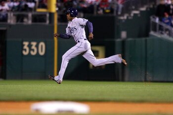PHILADELPHIA - OCTOBER 25:  B.J. Upton #2 of the Tampa Bay Rays steals second base in the top of the sixth inning against the Philadelphia Phillies during game three of the 2008 MLB World Series on October 25, 2008 at Citizens Bank Park in Philadelphia, P