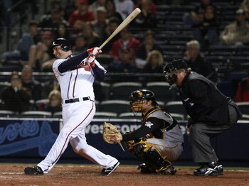 ATLANTA - MARCH 31: Right fielder Jeff Francoeur #7 of the Atlanta Braves follows through on a 12th inning solo home run during the game against the Pittsburgh Pirates at Turner Field March 31, 2008 in Atlanta, Georgia.  The Pirates beat the Braves 12-11 