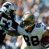 CHARLOTTE, NC - OCTOBER 19:  Na'il Diggs #53 of the Carolina Panthers tackles Jeremy Shockey #88 of the New Orleans Saints during the game at Bank of America Stadium on October 19, 2008 in Charlotte, North Carolina.  (Photo by Kevin C. Cox/Getty Images)