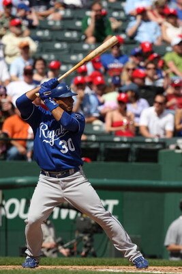 ARLINGTON, TX - APRIL 19:  Shortstop Mike Aviles #30 of the Kansas City Royals at bat on April 19, 2009 at Rangers Ballpark in Arlington, Texas.  (Photo by Ronald Martinez/Getty Images)