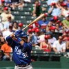 ARLINGTON, TX - APRIL 19:  Shortstop Mike Aviles #30 of the Kansas City Royals at bat on April 19, 2009 at Rangers Ballpark in Arlington, Texas.  (Photo by Ronald Martinez/Getty Images)