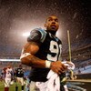 CHARLOTTE, NC - JANUARY 10:  Julius Peppers #89 of the Carolina Panthers walks off the field in the rain after being defeated by the Arizona Cardinals 33-13 in the NFC Divisional Playoff Game on January 10, 2009 at Bank of America Stadium in Charlotte, No