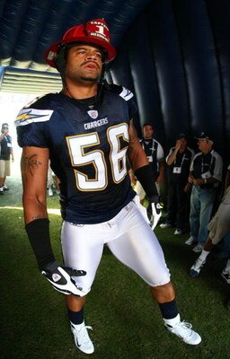 SAN DIEGO - OCTOBER 28:  Shawne Merriman #56 of the San Diego Chargers prepares to enter the game wearing a San Diego Fire helmet against the Houston Texans during the first half of their NFL game on October 28, 2007 at Qualcomm Stadium in San Diego, Cali