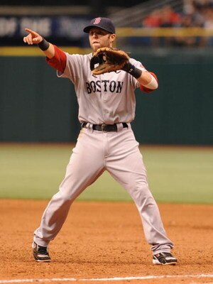 ST. PETERSBURG, FL - MAY 3: Infielder Dustin Pedroia #15 of the Boston Red Sox looks for a call against the Tampa Bay Rays May 3, 2009 at Tropicana Field in St. Petersburg, Florida. (Photo by Al Messerschmidt/Getty Images)
