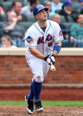 NEW YORK - MAY 09:  David Wright #5 of the New York Mets bats against the Pittsburgh Pirates on May 9, 2009 at Citi Field in the Flushing neighborhood of the Queens borough of New York City. The Mets defeated the Pirates 10-1.  (Photo by Jim McIsaac/Getty