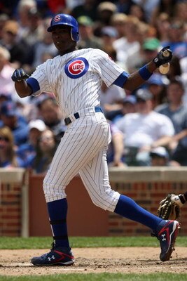 CHICAGO - MAY 2:  Alfonso Soriano #12 of the Chicago Cubs runs to first against the Florida Marlins during the game on May 2, 2009 at Wrigley Field in Chicago, Illinois. (Photo by Jonathan Daniel/Getty Images) 