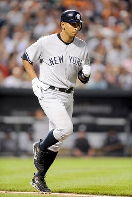 BALTIMORE - MAY 09:  Alex Rodriguez #13 of the New York Yankees runs to first base after a walk in the fourth inning against the Baltimore Orioles at Oriole Park at Camden Yards on May 9, 2009 in Baltimore, Maryland.  (Photo by Greg Fiume/Getty Images)