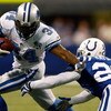 INDIANAPOLIS - DECEMBER 14:  Kevin Smith #34 of the Detroit Lions avoids a tackle by Kelvin Hayden #26 of the Indianapolis Colts on December 14, 2008 at Lucas Oil Stadium in Indianapolis, Indiana.  The Colts defeated the Lions 31-21.  (Photo by Chris Gray