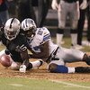 OAKLAND, CA - AUGUST 25: Oakland Raiders Doug Gabriel #85 dives for the ball with Detroit Lions safety Daniel Bullocks  #27in the first half as the Oakland Raiders host the Detroit Lions at McAfee Stadium on August 25, 2006 in Oakland, California. (Photo 