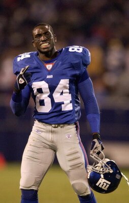 EAST RUTHERFORD, NJ - NOVEMBER 3:  Wide Receiver Tim M. Carter #84 of the New York Giants takes a timeout during the NFL game against the Jacksonville Jaguars at Giant Stadium on November 3, 2002 in East Rutherford, New Jersey.  The Giants defeated the Ja