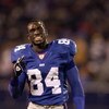 EAST RUTHERFORD, NJ - NOVEMBER 3:  Wide Receiver Tim M. Carter #84 of the New York Giants takes a timeout during the NFL game against the Jacksonville Jaguars at Giant Stadium on November 3, 2002 in East Rutherford, New Jersey.  The Giants defeated the Ja