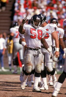 SAN FRANCISCO - SEPTEMBER 23:  Linebacker Jessie Tuggle #58 of the Atlanta Falcons on the field before a play during a game against the San Francisco 49ers at Candlestick Park on September 23, 1990 in San Francisco, California.  (Photo by George Rose/Gett