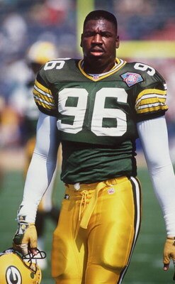11 SEP 1994:  SEAN JONES OF THE GREEN BAY PACKERS WALKS OFF THE FIELD DURING A 24-14 LOSS TO THE MIAMI DOLPHINS. Mandatory Credit: Jonathan Daniel/ALLSPORT