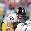 ATLANTA - NOVEMBER 1:  Quarterback Terry Bradshaw #12 of the Pittsburgh Steelers waits for the snap during the game against the Atlanta Falcons at Fulton County Stadium on November 1, 1981 in Atlanta, Georgia. The Steelers defeated the Falcons 34-20.  (Ph