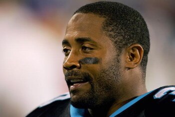 CHARLOTTE, NC - OCTOBER 03:  Mike Minter #30 of the Carolina Panthers sits on the sideline during the game with the Green Bay Packers on October 3, 2005 at Bank of America Stadium in Charlotte, North Carolina. The Panthers won 32-29. (Photo By Streeter Le