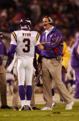 07 Jan 2002 : Head coach Mike Tice of the Minnesota Vikings  advises quarterback Spergon Wynn #3 during the game against the Baltimore Ravens at PSINet Stadium in Baltimore, Maryland. The Ravens won 19-3. DIGITAL IMAGE. Mandatory Credit: Doug Pensinger/Ge