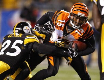 PITTSBURGH - NOVEMBER 20: Chris Henry #15 of the Cincinnati Bengals battles for extra yardage against Ryan Clark #25 of the Pittsburgh Steelers after a first-quarter catch on November 20, 2008 at Heinz Field in Pittsburgh, Pennsylvania.  (Photo by Gregory