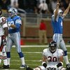 DETROIT - OCTOBER 20:  Place kicker Jason Hanson #4 of the Detroit Lions celebrates after kicking the game winning field goal in overtime as Mike Brown #30 and Roosevelt Williams #20 of the Chicago Bears react, stunned, during the NFL game at Ford Field i