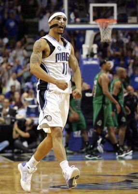 ORLANDO, FL - MAY 08:  Courtney Lee #11 of the Orlando Magic celebrates against the Boston Celtics in Game Three of the Eastern Conference Semifinals during the 2009 NBA Playoffs at Amway Arena on May 8, 2009 in Orlando, Florida. NOTE TO USER: User expres