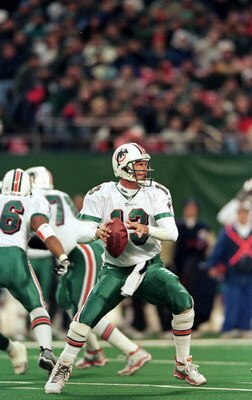 12 Dec 1999: Dan Marino #13 of the Miami Dolphins gets ready to pass the ball during the game against the New York Jets at the Meadowlands in East Rutherford, New Jersey. The Jets defeated the Dolphins 28-20. Mandatory Credit: Al Bello /Allsport