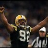 26 Jan 1997:  Defensive lineman Reggie White of the Green Bay Packers celebrates after sacking New England Patriots quarterback Drew Bledsoe during Super Bowl XXXI at the Superdome in New Orleans, Louisiana.  The Packers won the game, 35-21. Mandatory Cre