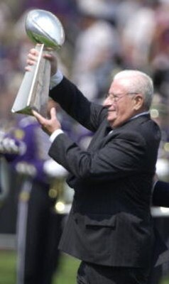 9 Sep 2001: Art Modell, owner of the Baltimore Ravens presents the superbowl trophy to the crowd during pre-game festivities at the game against the Chicago Bears at PSINet Stadium in Baltimore, Maryland. The Ravens won 17-6. DIGITAL IMAGE. Mandatory Cre