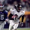 28 Jan 2001:  Jermaine Lewis #84 of the Baltimore Ravens runs with the ball for an 84 yard touchdown return during the Super Bowl XXXV Game against the New York Giants at the Raymond James Stadium in Tampa, Florida. The Ravens defeated the Giants 34-7. Ma