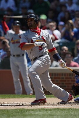 CHICAGO - APRIL 17:  Albert Pujols #5 of the St. Louis Cardinals bats against the Chicago Cubs on April 17, 2009 at Wrigley Field in Chicago, Illinois. (Photo by Jonathan Daniel/Getty Images) 