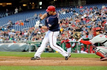 WASHINGTON - APRIL 16:  Adam Dunn #44 of the Washington Nationals hits a home run in the first inning against the Philadelphia Phillies at Nationals Park on April 16, 2009 in Washington, DC.  (Photo by Greg Fiume/Getty Images)