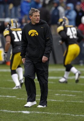 IOWA CITY, IOWA - NOVEMBER 8: Head Coach Kirk Ferentz of the Iowa Hawkeyes runs his team through pre-game drills before taking on the  Penn State Nittany Lions at Kinnick Stadium on November 8, 2008 in Iowa City, Iowa. Iowa defeated Penn State  24-23. (Ph