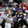 EVANSTON, IL - NOVEMBER 11:  Vernon Gholston #50 of the Ohio State Buckeyes closes in on a sack against Mike Kafka #13 of the Northwestern Wildcats on November 11, 2006 at Ryan Field in Evanston, Illinois. Ohio State defeated Northwestern 54-10.  (Photo b