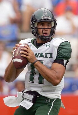 GAINESVILLE, FL - AUGUST 30:  Quarterback Kawika Funaki #11 of the Hawaii Warriors looks to pass the ball during the game against the Florida Gators at Ben Hill Griffin Stadium on August 30, 2008 in Gainesville, Florida.  (Photo by Sam Greenwood/Getty Ima