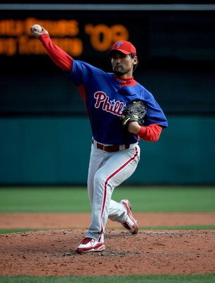 LAKE BUENA VISTA, FL - MARCH 01:  Pitcher Chan Ho Park #61 of the Philadelphia Phillies throws in a spring training game against the Atlanta Braves at Champion Stadium on March 1, 2009 in Lake Buena Vista, Florida.  (Photo by Sam Greenwood/Getty Images)