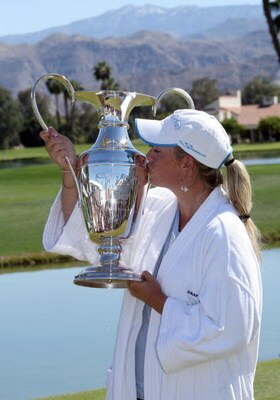 RANCHO MIRAGE, CA - APRIL 05: Brittany Lincicome of the USA holds the trophy after the final round of the 2009 Kraft Nabisco Championship, at the Mission Hills Country Club on April 5, 2009 in Rancho Mirage, California (Photo by David Cannon/Getty Images)