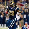 ST. LOUIS, MO - SEPTEMBER 14: Steven Jackson #39 of the St. Louis Rams rushes against Antonio Pierce #58 of the New York Giants at the Edward Jones Dome on September 14, 2008 in St. Louis, Missouri. (Photo by Dilip Vishwanat/Getty Images)