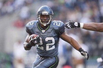 SEATTLE - NOVEMBER 23:  Julius Jones #22 the Seattle Seahawks carries the ball during the game against the Washington Redskins on November 23, 2008 at Qwest Field in Seattle, Washington. (Photo by Otto Greule Jr/Getty Images)