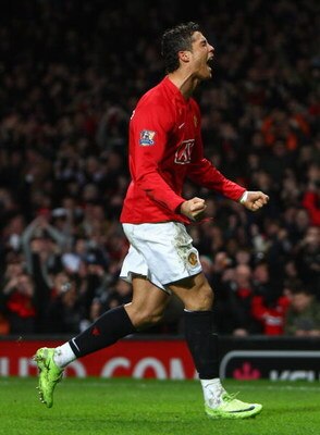MANCHESTER, UNITED KINGDOM - FEBRUARY 21:  Cristiano Ronaldo of Manchester United celebrates scoring his team's second goal during the Barclays Premier League match between Manchester United and Blackburn Rovers at Old Trafford on February 21, 2009 in Man