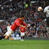 MANCHESTER, ENGLAND - APRIL 25:  Cristiano Ronaldo of Manchester United scores his team's third goal during the Barclays Premier League match between Manchester United and Tottenham Hotspur at Old Trafford on April 25, 2009 in Manchester, England.  (Photo