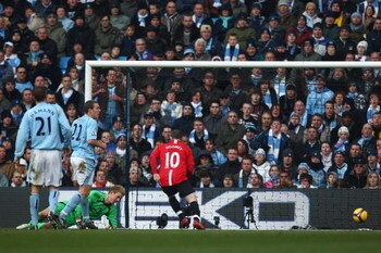 MANCHESTER, UNITED KINGDOM - NOVEMBER 30:  Wayne Rooney of Manchester United scores the opening goal during the Barclays Premier League match between Manchester City and Manchester United at The City of Manchester Stadium on November 30, 2008 in Mancheste