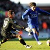 STOKE, UNITED KINGDOM - DECEMBER 26:  Carlos Tevez of Manchester United tries to go past Thomas Sorensen of Stoke City during the Barclays Premier League match between Stoke City and Manchester United at the Britannia Stadium on  December 26, 2008 in Stok