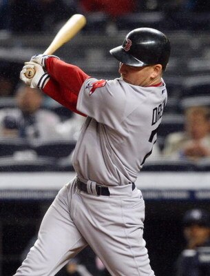 NEW YORK - MAY 04:  J.D. Drew #7 of the Boston Red Sox bats against of the New York Yankees on May 4, 2009 at Yankee Stadium in the Bronx borough of New York City. The Red Sox defeated the Yankees 6-4.  (Photo by Jim McIsaac/Getty Images)
