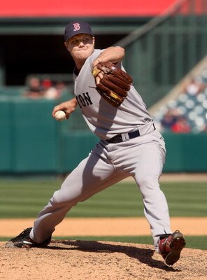 ANAHEIM, CA - MAY 14:  Pitcher Jonathan Papelbon #58 of the Boston Red Sox throws a pitch in the 11th inning against the Los Angeles Angels of Anaheim on May 14, 2009 at Angel Stadium in Anaheim, California.  The Angels won 5-4 in 12 innings.   (Photo by 
