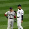 NEW YORK - MAY 05:  Derek Jeter #2 of the New York Yankees talks with Dustin Pedroia #15 of the Boston Red Sox prior to their game on May 5, 2009 at Yankee Stadium in the Bronx borough of New York City.  (Photo by Jim McIsaac/Getty Images)