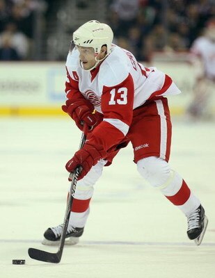 COLUMBUS, OHIO - APRIL 23:  Pavel Datsyuk #13 of the Detroit Red Wings skates with the puck against the Columbus Blue Jackets during Game Four of the Western Conference Quarterfinals of the 2009 Stanley Cup Playoffs on April 23, 2009 at the Nationwide Are