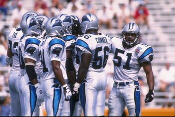 1 Oct 1995:  Linebacker Sam Mills #51 of the Carolina Panthers looks to the sideline for the defensive alignment call while standing in the team huddle in between plays during the Panthers 20-13 loss to the Tampa Bay Buccaneers at Memorial Stadium in Clem