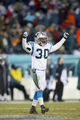 PHILADELPHIA - JANUARY 18:  Safety Mike Minter #30 of the Carolina Panthers celebrates on the field during the game against the Philadelphia Eagles in the NFC Championship game on January 18, 2004 at Lincoln Financial Field in Philadelphia, Pennsylvania. 